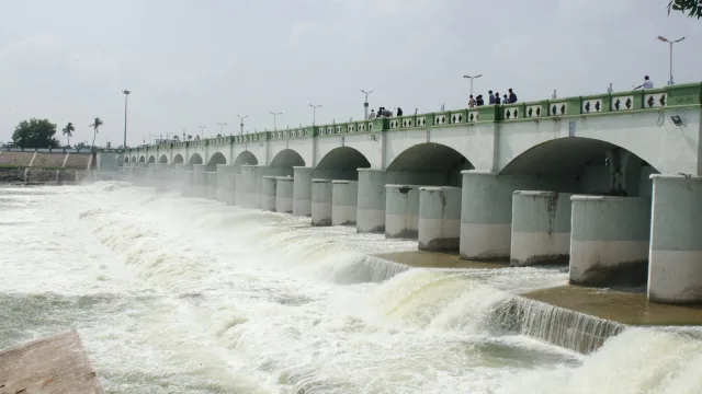 Kaveri river water foaming as it pours beneath the arched bridge of the Kallanai (Grand Anicut) in Thanjavur district, Tamil Nadu