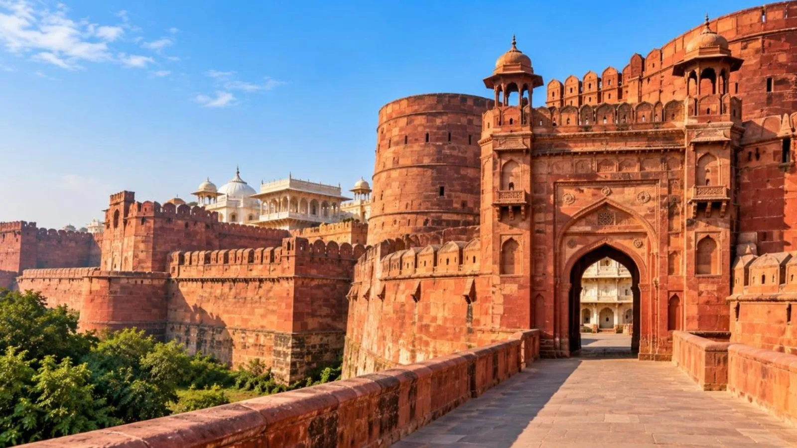 Red sandstone walls and gateway of Agra Fort in golden afternoon light